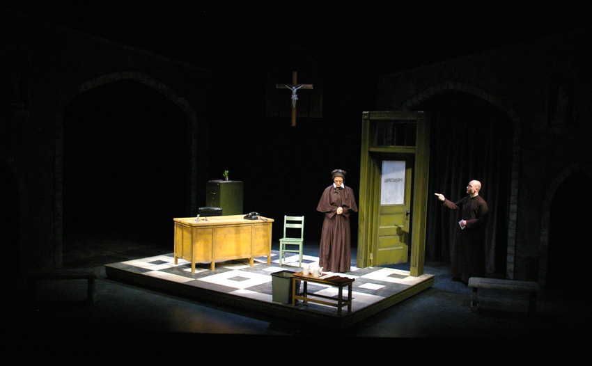 Father Flynn goes to the principal's office in DOUBT at Portland Stage Company 
